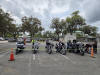 May be an image of 5 people, scooter, motorcycle and road